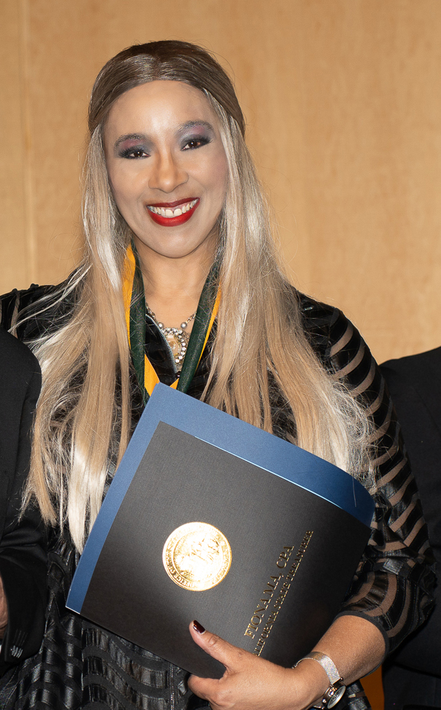 Kaylene-Peoples-honored-with-a-medal-and-certificates -and-signed-by-State-Legislature-at-the-2024 Olympia Arts-Awards-on-November-10th-2024.